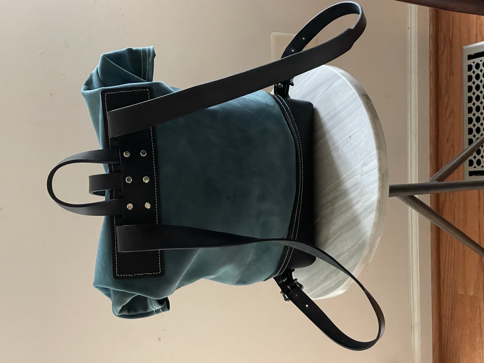 Roll top backpack side view