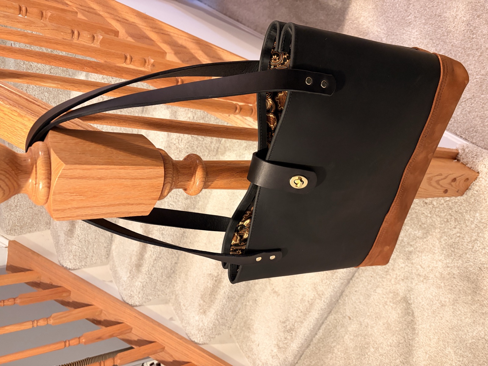Tote bag exterior on stair railing