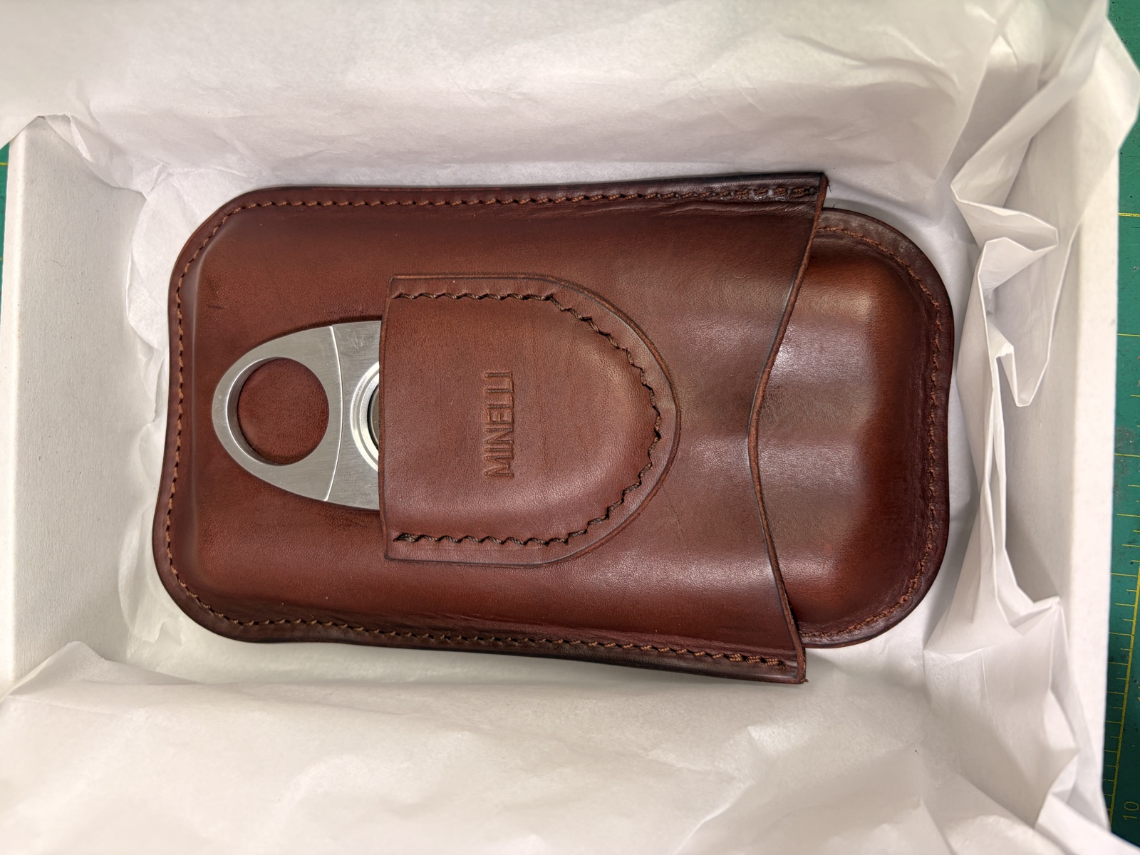 Three-stick cigar case in Minerva Vacchetta leather with a monogrammed cigar cutter pocket
